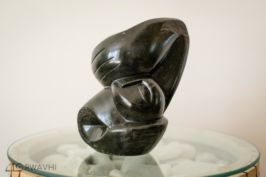 1. Title: Hold Me Artist: David Gopito Medium: Black Serpentine